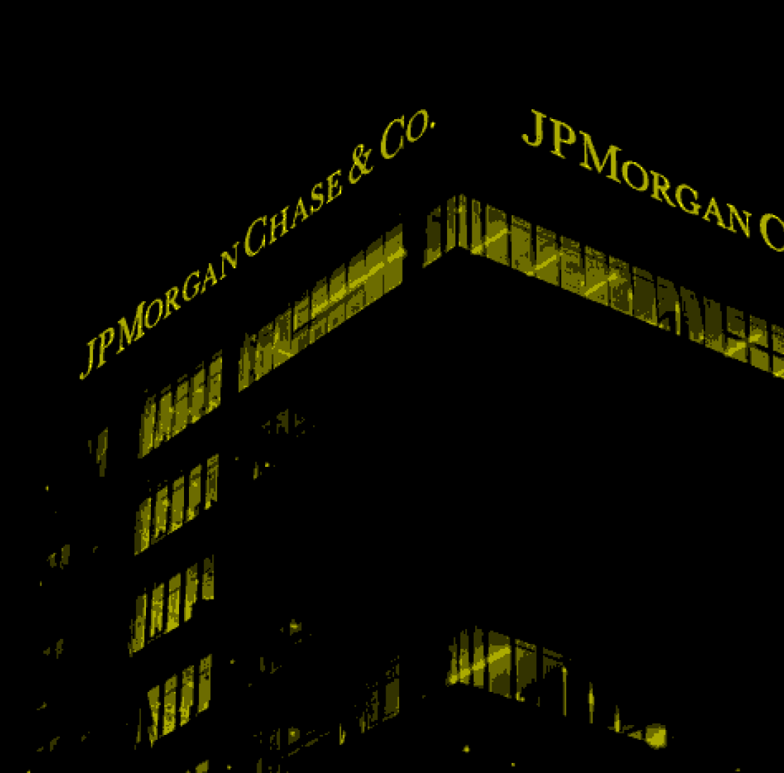 Skyline of financial-district towers lit at night